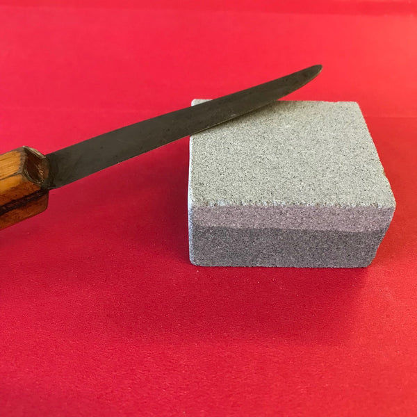 Sharpening Scissors with a Stone 